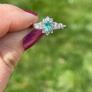 Emerald and White Zircon Halo Ring